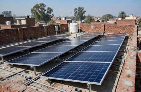 Rooftop solar panel installation on a brick home in Lahore, Pakistan